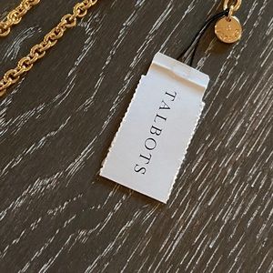 gold Talbots necklace with flower pendant.